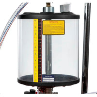 Extracteur d'huile avec réservoir de contrôle